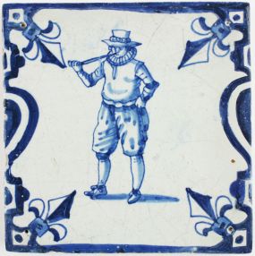 Antique Dutch Delft tile in blue with a man smoking a tobacco pipe, 17th century
