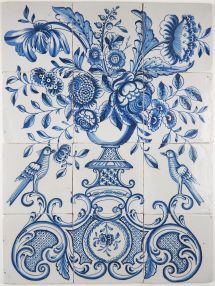 Antique Delft tile mural with a richly decorated flower vase in blue, 18th century