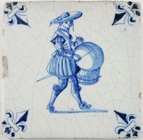 Antique Dutch Delft tile with a drummer (military) in blue, 17th century
