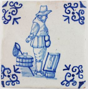 Antique Dutch Delft tile in blue with a fisherman, 17th century