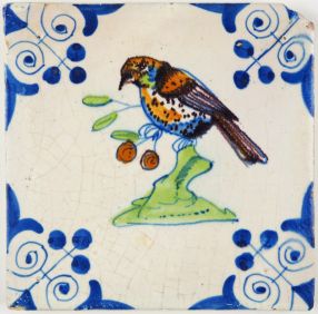 Antique Delft tile with a beautiful polychrome bird, 17th century