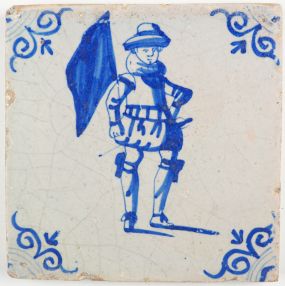 Antique Dutch Delft tile with a standard-bearer in blue, 17th century