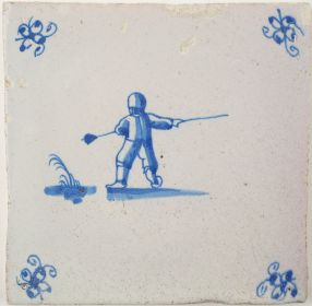 Antique Delft tile with a man using a pole to jump across a ditch, 17th century