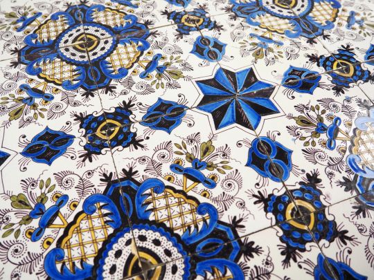 Antique Dutch Delft polychrome ornamental wall tiles known as