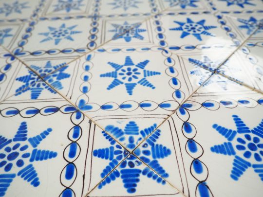 Antique Delft wall tiles with the Chain Star ornament, 19th century