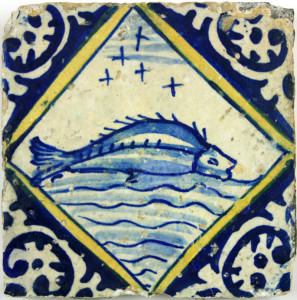Early 17th century Delft tile with a fish in a diamond square